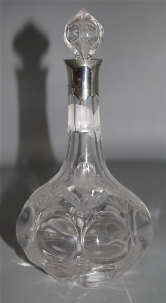 An Edwardian silver mounted Stourbridge rock crystal cut glass decanter and stopper, 9.25in.